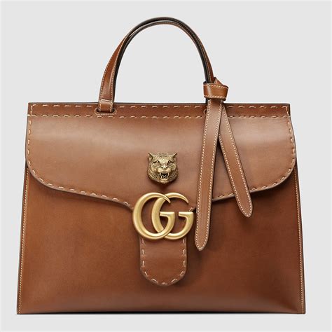 sacoche gucci marron|Gucci marmont clutch bag.